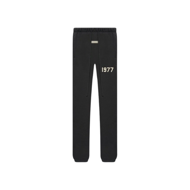 Black sweatpants with '1977' printed on a white background